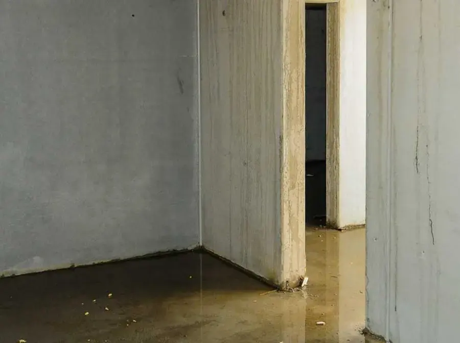 Standing water along the walls of a block basement in Ballwin, MO